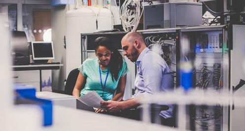powerdms-assets-photos-079-people-working-in-server-room