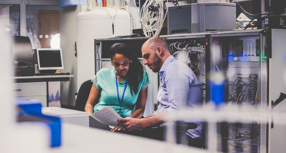powerdms-assets-photos-079-people-working-in-server-room