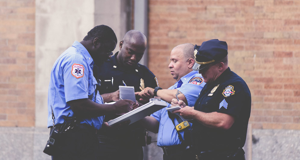 powerdms-assets-photos-081-cops-working-together