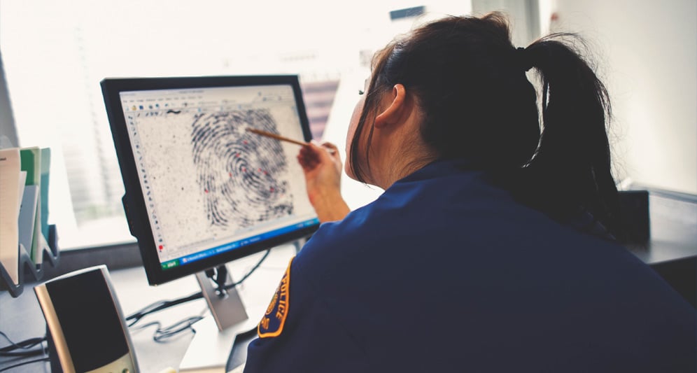 powerdms-assets-photos-078-women-cop-computer