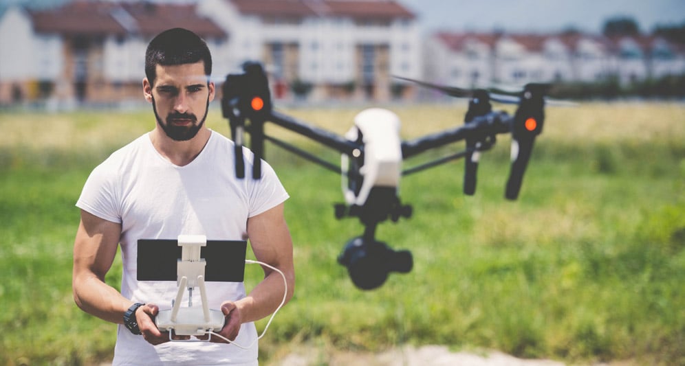 powerdms-assets-photos-044-man-flying-drone