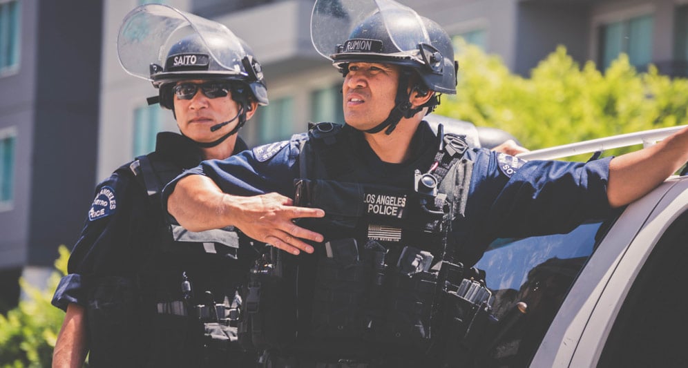 powerdms-assets-photos-069-cops-riot-gear-action