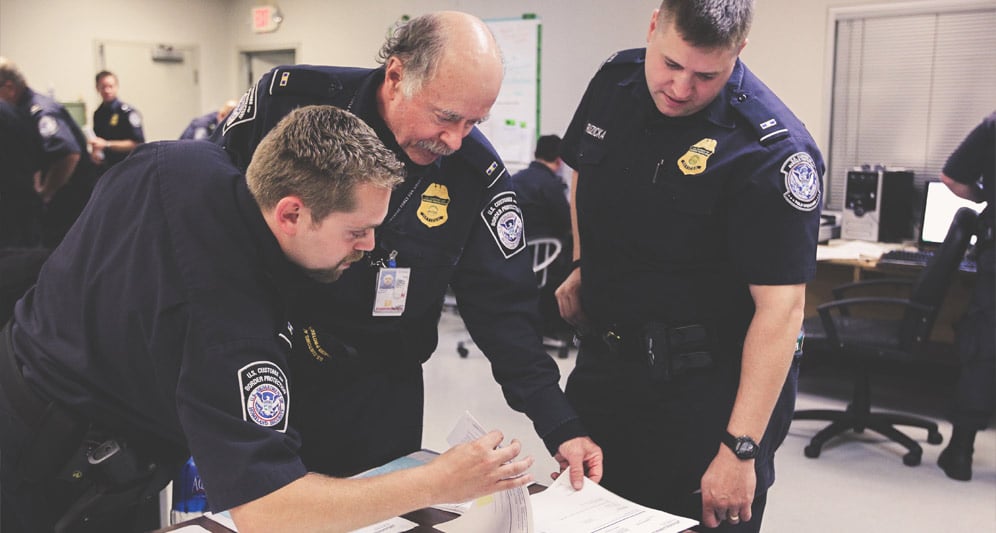 powerdms-assets-photos-093-cops-doing-paperwork