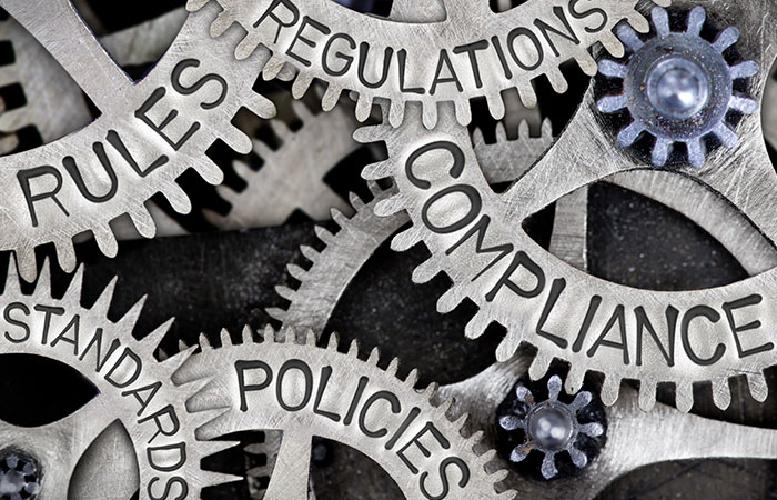 interconnected gears of regulations, rules, and policies