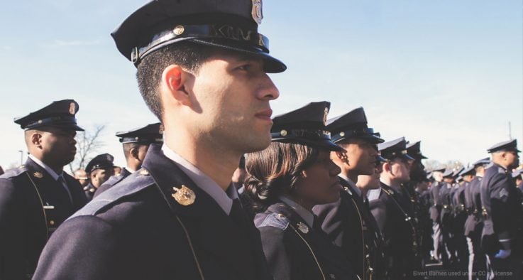 Millennial law enforcement officers standing in a line.