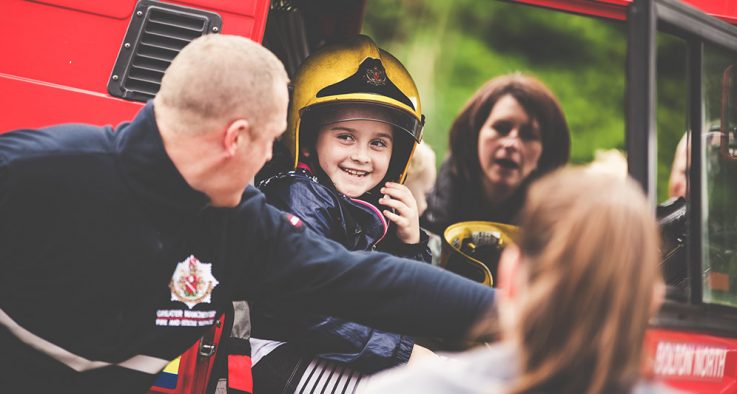 firefighter with boy