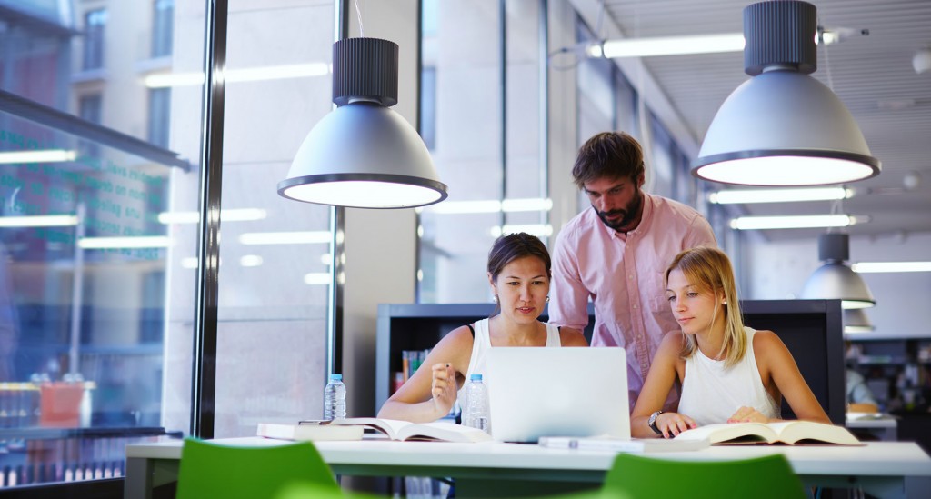 coworkers reviewing policies together