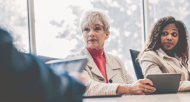 Older business woman in a meeting