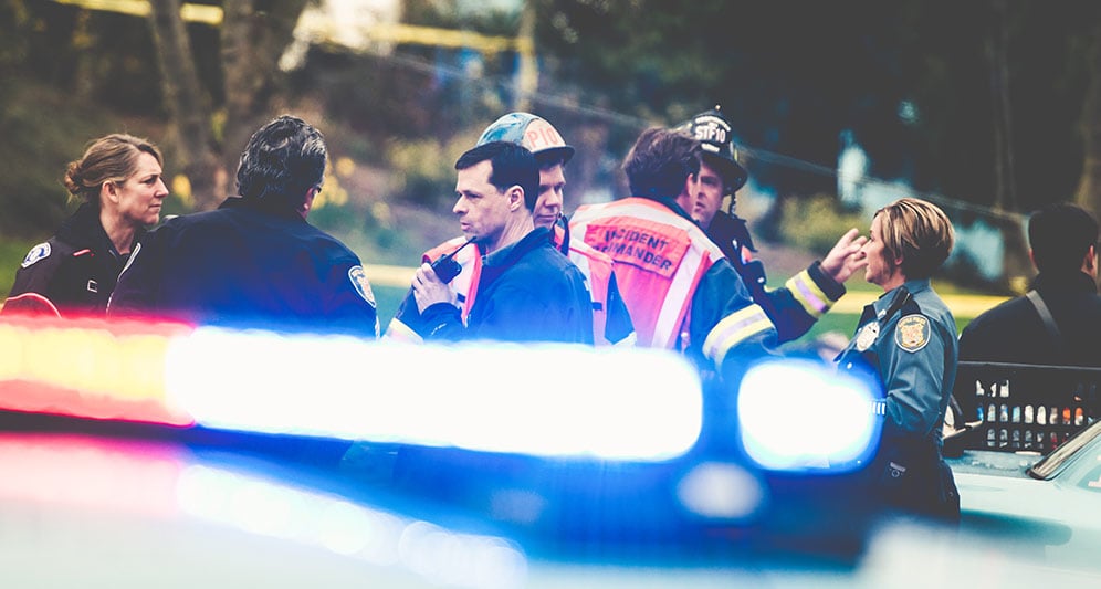 police lights with first responders in the background