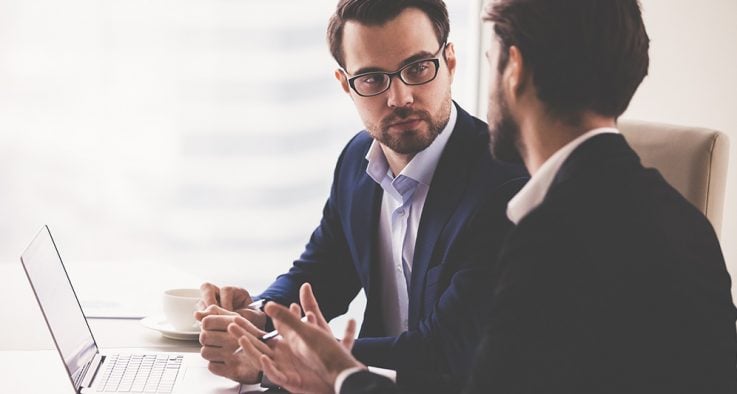 two businessmen talking