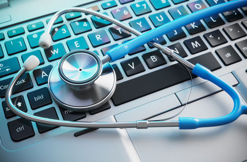 stethoscope on a laptop keyboard