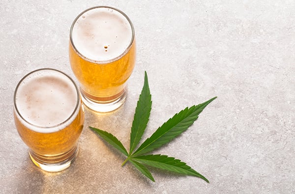 beer and marijuana leaf